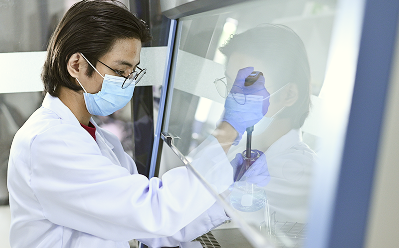 Lab technician extracting DNA